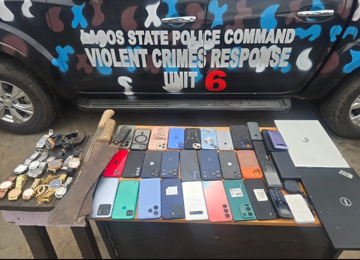 Laptops, phones, cutlasses, jewelry seized from the four suspects by the Lagos State Police Command