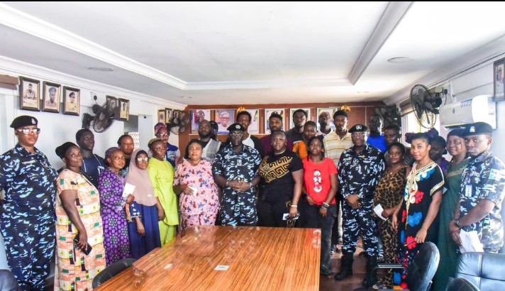 The Lagos State Commissioner of Police and families of deceased police officers at the welfare presentation event at the Lagos State Police Command Headquarters, Ikeja