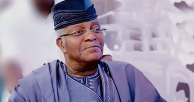 Brigadier-General Mobolaji Johnson in an Agbada and cap